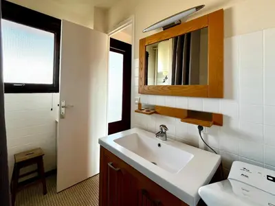 Salle de bains dans l'établissement L'écume de Mer - T1 BIS Vue océan