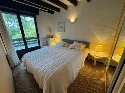 Un ou plusieurs lits dans un hébergement de l'établissement Seignosse Océan Villa patio familiale 5/6 personnes – Jardin terrasses – Plage à pied