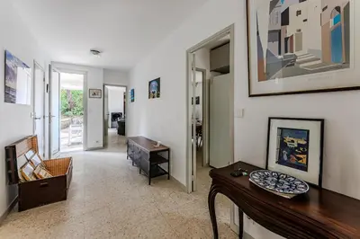 Coin salon dans l'établissement Maison au coeur des pins