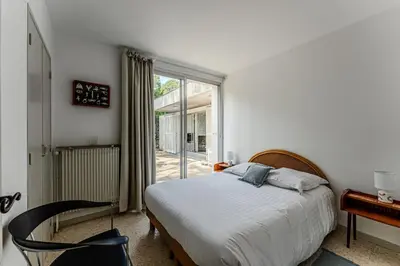 Un ou plusieurs lits dans un hébergement de l'établissement Maison au coeur des pins