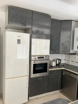Cuisine ou kitchenette dans l'établissement Maison au coeur des pins
