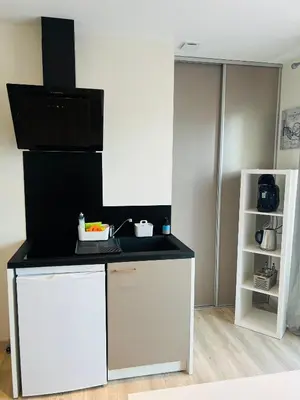 Cuisine ou kitchenette dans l'établissement La Perla