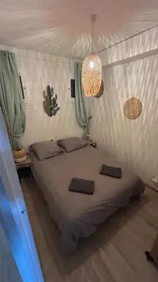 Un ou plusieurs lits dans un hébergement de l'établissement Appartement - vue mer Plage à pied - Capbreton