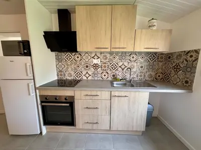 Cuisine ou kitchenette dans l'établissement MAISON 4 couchages