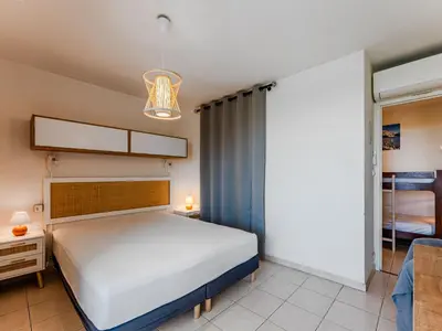 Un ou plusieurs lits dans un hébergement de l'établissement Biscarrosse-Plage : Appartement Climatisé Vue Océan, 4 Pers, Parking - FR-1-521-267