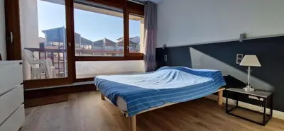 Un ou plusieurs lits dans un hébergement de l'établissement Appartement Laurens Vue Port et Océan 4 pers