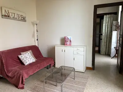 Coin salon dans l'établissement Chateau du Rau apt2