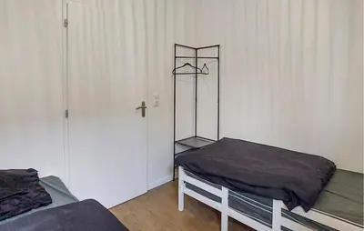 Un ou plusieurs lits dans un hébergement de l'établissement 3 Bedroom Awesome Home In Mimizan