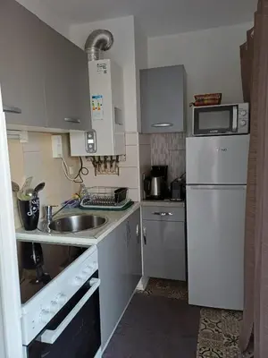 Cuisine ou kitchenette dans l'établissement Charmant studio avec balcon à Saint-Paul-lès-Dax 25 m²