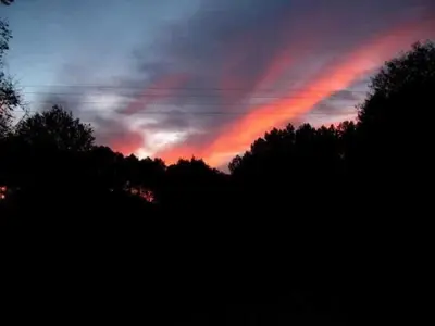 Lever ou coucher de soleil vu de la maison de vacances ou à proximité