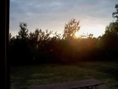 Lever ou coucher de soleil vu de la maison de vacances ou à proximité
