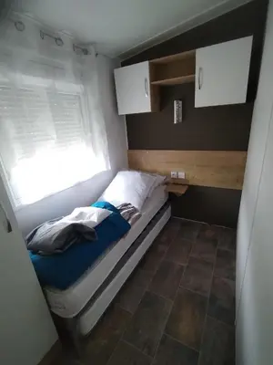 Un ou plusieurs lits dans un hébergement de l'établissement Camping Les dunes de contis
