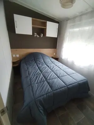 Un ou plusieurs lits dans un hébergement de l'établissement Camping Les dunes de contis