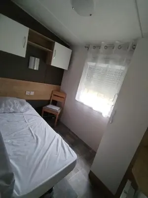 Un ou plusieurs lits dans un hébergement de l'établissement Camping Les dunes de contis