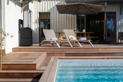 Piscine de l'établissement Divine villa au calme - Entre Moulleau et Golf ou située à proximité