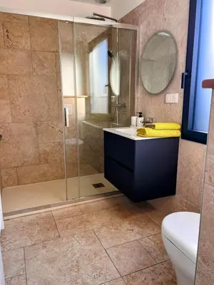 Salle de bains dans l'établissement TI CASE Vacation - pool, lakes and forest by bike