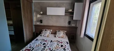 Un ou plusieurs lits dans un hébergement de l'établissement Mobil-home Camping Les Oyats 4 Etoiles, Seignosse, Landes