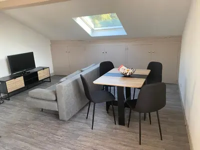 Télévision ou salle de divertissement dans l'établissement Appartement T3