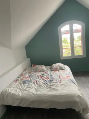 Un ou plusieurs lits dans un hébergement de l'établissement Appartement T3