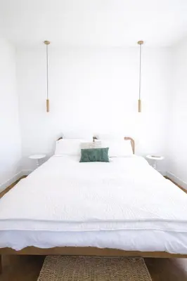Un ou plusieurs lits dans un hébergement de l'établissement Maison Lilio, rénovée calme et confort
