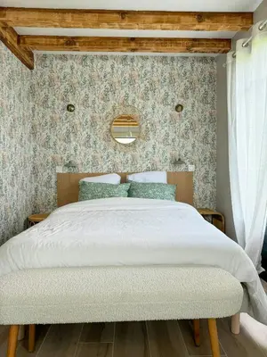 Un ou plusieurs lits dans un hébergement de l'établissement Family Lodge Between Lake And Wild Beach