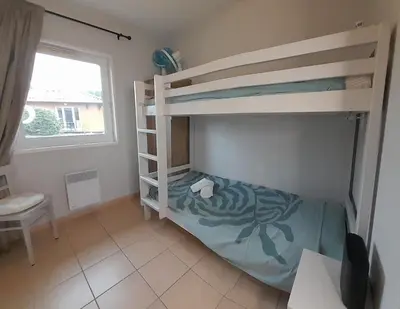 Un ou plusieurs lits dans un hébergement de l'établissement villa, climatisé domaine des grands lacs