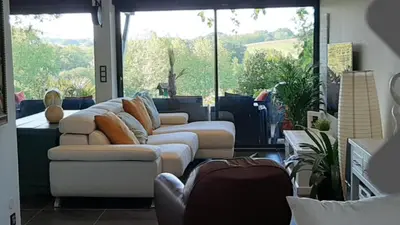 Coin salon dans l'établissement Villa piscine urt