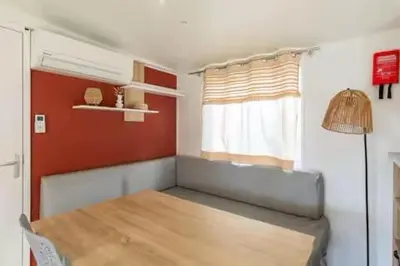 Coin salon dans l'établissement Mobil-home spacieux Capbreton - Proche plage