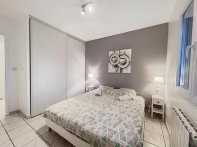 Un ou plusieurs lits dans un hébergement de l'établissement VILLA PYLA SUR MER - INDIVIDUELLE avec PISCINE CHAUFFÉE