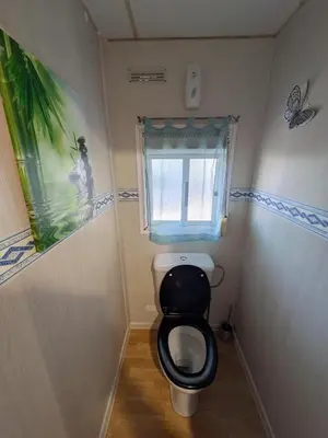 Salle de bains dans l'établissement Mobil-Home La Pointe 5 pers camping 4 étoiles