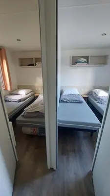 Un ou plusieurs lits dans un hébergement de l'établissement MH 353 tout confort 3 chambres et 2 salles de bain dans camping 4 étoiles