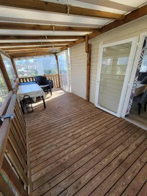 Balcon ou terrasse dans l'établissement MH 470 3chambres et 1salle de bain dans camping 4 étoiles