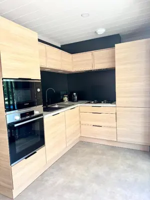 Cuisine ou kitchenette dans l'établissement Parc Résidentiel de loisirs Les Platanes