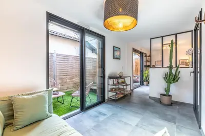 Coin salon dans l'établissement Numa - Maison de ville 6 personnes