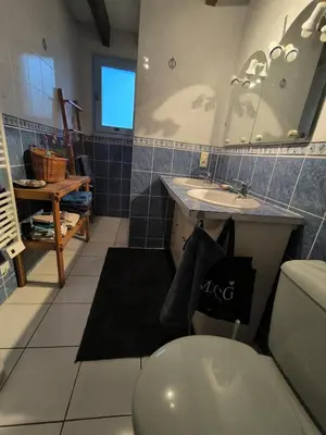 Salle de bains dans l'établissement Ocean et Forêt