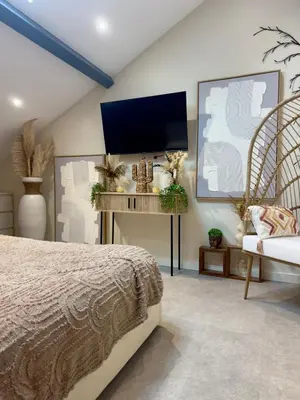 Télévision ou salle de divertissement dans l'établissement Your stay in a modern and warm two-room apartment