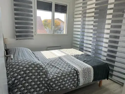Un ou plusieurs lits dans un hébergement de l'établissement Appartement Mimizan Plage