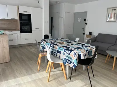 Cuisine ou kitchenette dans l'établissement Appartement Mimizan Plage