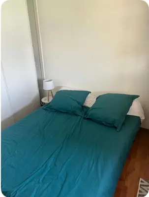 Un ou plusieurs lits dans un hébergement de l'établissement Grand appartement avec Terrasse entre la plage Sud et la Centrale