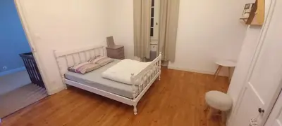 Un ou plusieurs lits dans un hébergement de l'établissement Maison 12 couchages avec piscine privée