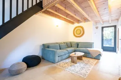 Coin salon dans l'établissement Maison avec Spa et Accès direct au Lac de Cazaux