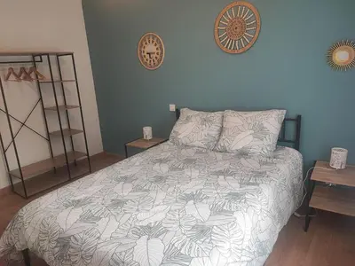Un ou plusieurs lits dans un hébergement de l'établissement Maison au calme à deux pas du lac