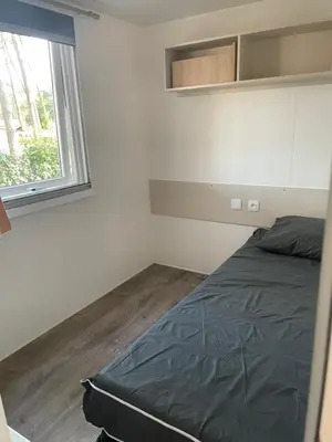 Un ou plusieurs lits dans un hébergement de l'établissement MH 459 3 chambres et 1 salle de bain dans camping 4 étoiles