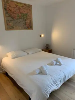 Un ou plusieurs lits dans un hébergement de l'établissement Villa d'Exception 7 chambres au coeur du golf de Biscarrosse