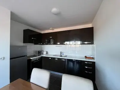 Cuisine ou kitchenette dans l'établissement Appartement cosy centre-ville, animaux admis - 6 pers. - FR-1-319-629