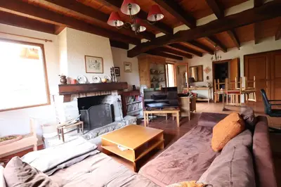 Coin salon dans l'établissement Landaise Lou Pao, 2 maisons, piscine, Lac de Léon