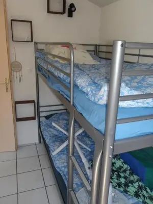 Un ou plusieurs lits dans un hébergement de l'établissement Chalet