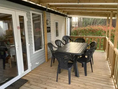Balcon ou terrasse dans l'établissement Mobile Home grand confort 4 à 6personnes au bord du lac de Biscarosse camping 4 étoiles