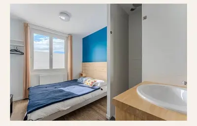 Un ou plusieurs lits dans un hébergement de l'établissement Gîte Oustaou Biscarrosse Plage 7 chambres 15 personnes