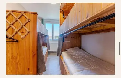 Un ou plusieurs lits dans un hébergement de l'établissement Gîte Oustaou Biscarrosse Plage 7 chambres 15 personnes